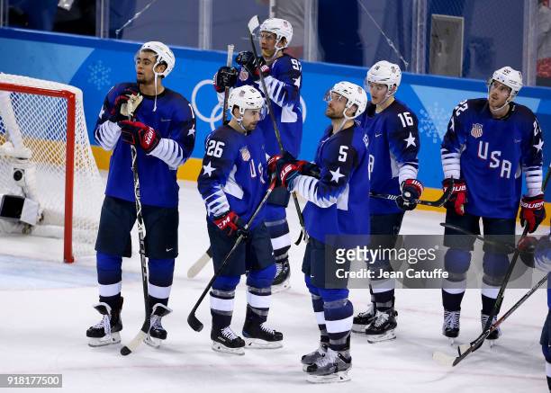 Jordan Greenway, Mark Arcobello, Noah Welch, Ryan Donato, Bobby Sanguinetti of USA look dejected after losing in overtime during the Ice Hockey Men...