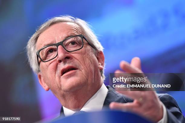 European Commission President Jean-Claude Juncker gestures as he delivers a speech during a press conference at the European Commission in Brussels...