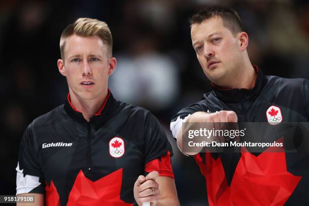 Marc Kennedy and Ben Hebert of Canada compete in the Curling Men's Round Robin Session 1 held at Gangneung Curling Centre on February 14, 2018 in...