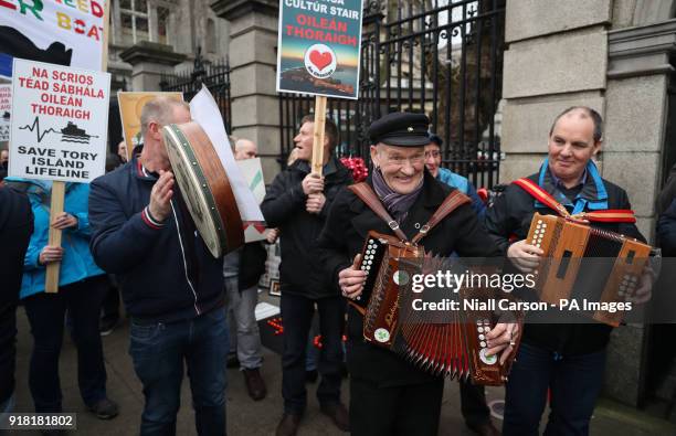 Tory islanders, led by the King of Tory Patsy Dan Rodgers , protest outside Leinster House in Dublin against the government's decision to award a...