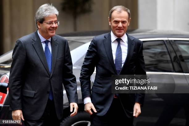 Italian Prime Minister Paolo Gentiloni welcomes European Council President Donald Tusk as he arrives for a meeting at the Palazzo Chigi in Rome on...