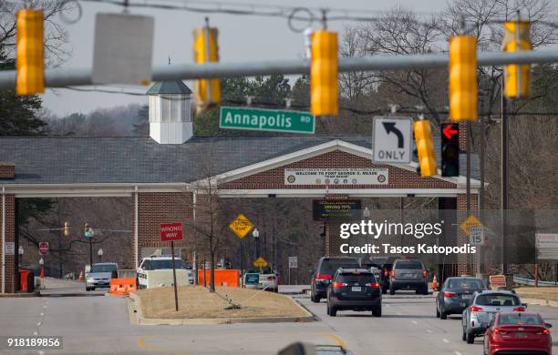 Cars travel through the main gate at Fort Meade on February 14, 2018 in Fort Meade, Maryland. According to reports, one person was injured in a...