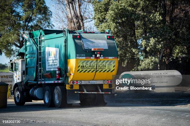 Waste Management Inc. Garbage collection truck enters the company's Davis Street Recycling & Transfer Station in San Leandro, California, U.S., on...