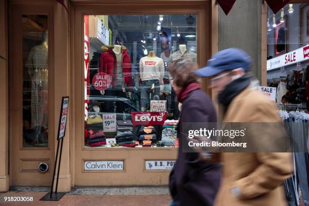 Pedestrians pass in front of a Levi Strauss & Co. Store in the SoHo neighborhood of New York, U.S., on Friday, Feb. 9, 2018. Bloomberg is scheduled...