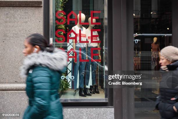 Pedestrians pass in front of a Bershka Magyaroszag Kft store in the SoHo neighborhood of New York, U.S., on Friday, Feb. 9, 2018. Bloomberg is...