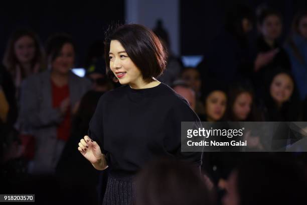 Designer Eva Xu poses backstage for the All Comes From Nothing x COOME FW18 show at Gallery II at Spring Studios on February 14, 2018 in New York...