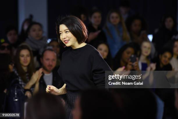 Designer Eva Xu poses backstage for the All Comes From Nothing x COOME FW18 show at Gallery II at Spring Studios on February 14, 2018 in New York...