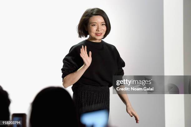 Designer Eva Xu poses backstage for the All Comes From Nothing x COOME FW18 show at Gallery II at Spring Studios on February 14, 2018 in New York...