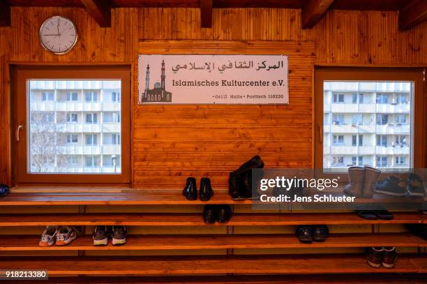 Shoes of mosque visitors stand on a shelf in the Muslim cultural center and mosque as Aydan Ozoguz , German Federal Commissioner for Immigration,...