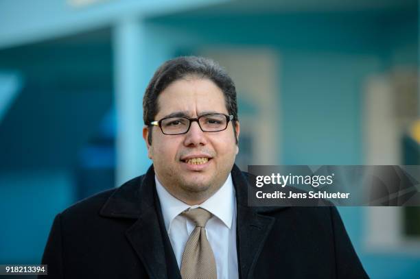 Abdassamad El Yazidi, Secretary General of the Central Council of Muslims, stands in the front in the Muslim cultural center and mosque as Aydan...