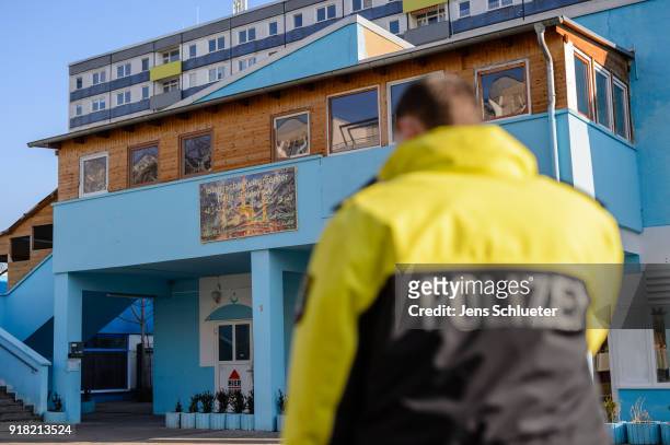 Policemen secures the Muslim cultural center and mosque following a recent attack just before the beginning of the visit of Aydan Ozoguz , German...