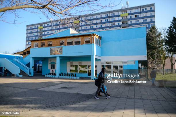 Two people walk past the Muslim cultural centre and mosque as Aydan Ozoguz , German Federal Commissioner for Immigration, Refugees and Integration,...
