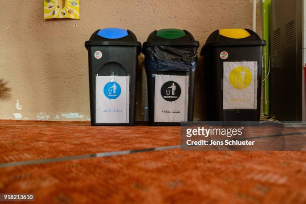 Three garbage container stand in the Muslim cultural center and mosque as Aydan Ozoguz , German Federal Commissioner for Immigration, Refugees and...