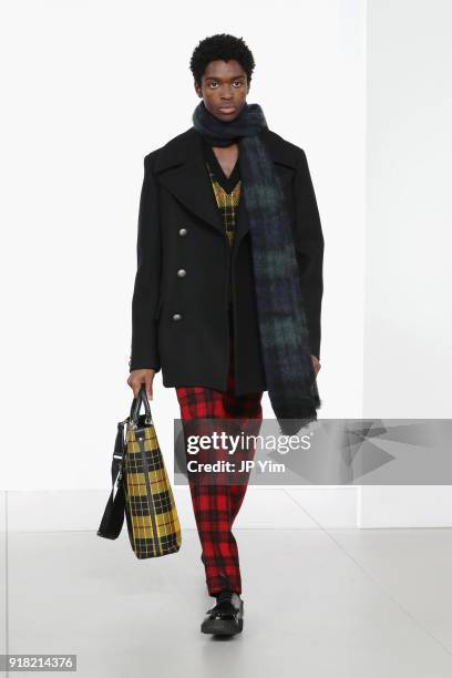 Model walks the runway during the Michael Kors Collection Fall 2018 Runway Show at Vivian Beaumont Theatre at Lincoln Center on February 14, 2018 in...