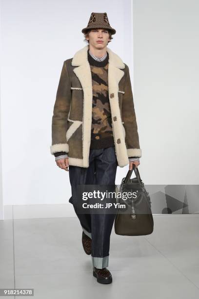 Model walks the runway during the Michael Kors Collection Fall 2018 Runway Show at Vivian Beaumont Theatre at Lincoln Center on February 14, 2018 in...