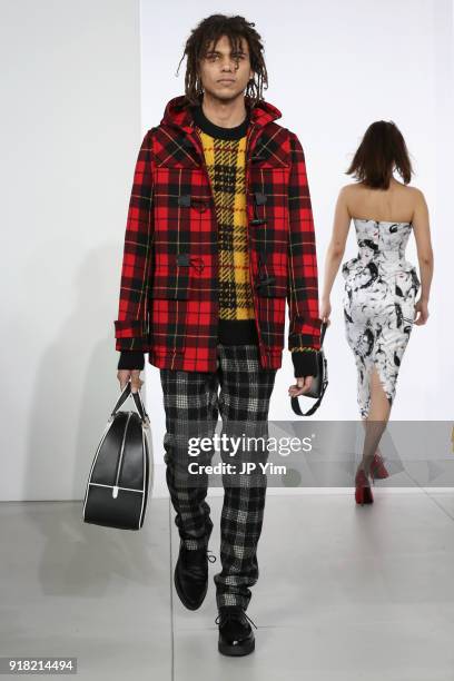 Model walks the runway during the Michael Kors Collection Fall 2018 Runway Show at Vivian Beaumont Theatre at Lincoln Center on February 14, 2018 in...