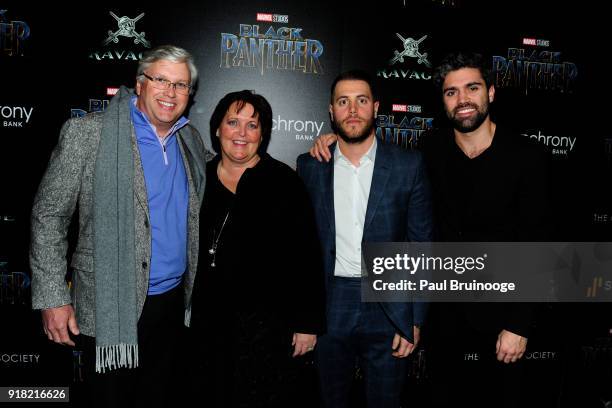 Bart Schaller and Margaret Kean attend The Cinema Society with Ravage Wines & Synchrony host a screening of Marvel Studios' "Black Panther" at The...