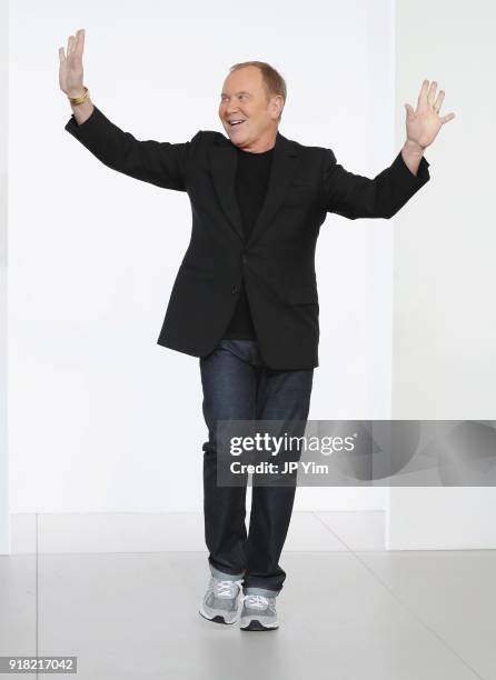 Designer Michael Kors walks the runway during the Michael Kors Collection Fall 2018 Runway Show at Vivian Beaumont Theatre at Lincoln Center on...