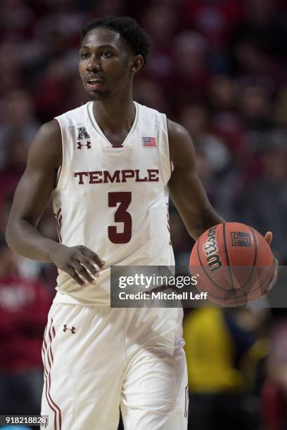 Shizz Alston Jr. #3 of the Temple Owls dribbles the ball against the Villanova Wildcats at the Liacouras Center on December 13, 2017 in Philadelphia,...