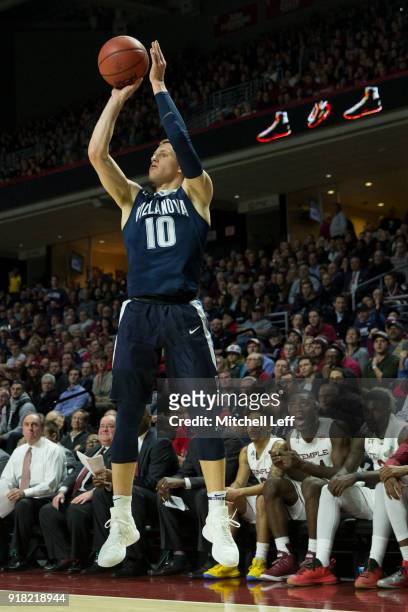 Donte DiVincenzo of the Villanova Wildcats shoots the ball against the Temple Owls at the Liacouras Center on December 13, 2017 in Philadelphia,...