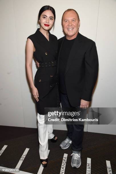 Davika Hoorne and Michael Kors attend the Michael Kors Collection Fall 2018 Runway Show at Vivian Beaumont Theatre at Lincoln Center on February 14,...