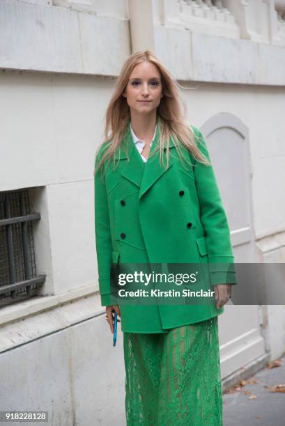 Fashion blogger Charlotte Groeneveld of The Fashion Guitar wears a Valentino jacket, shoes and skirt day 6 of Paris Womens Fashion Week Spring/Summer...