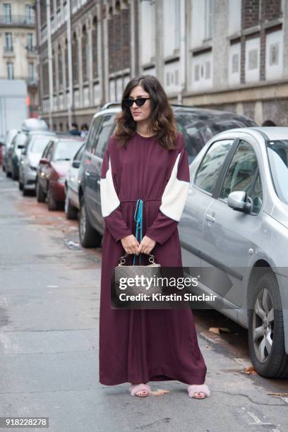 Fashion blogger Eleonora Carisi wears a Valentino jumpsuit, shoes and bag and Le Specs sunglasses day 6 of Paris Womens Fashion Week Spring/Summer...