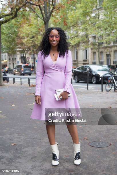 Fashion stylist Shiona Turini wears a Valentino dress and boots and Gentle Monster sunglasses day 6 of Paris Womens Fashion Week Spring/Summer 2018,...