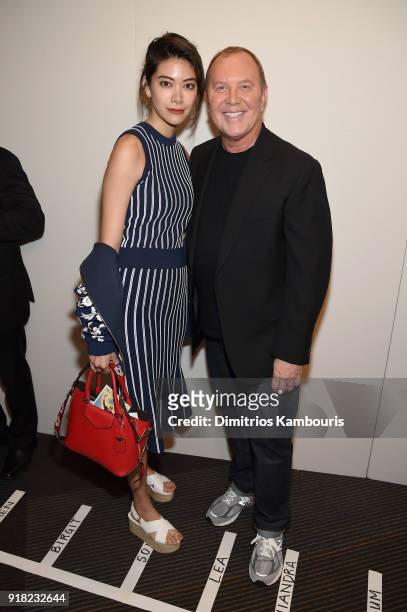 Hikari Mori and Michael Kors attend the Michael Kors Collection Fall 2018 Runway Show at Vivian Beaumont Theatre at Lincoln Center on February 14,...