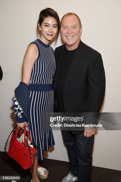 Hikari Mori and Michael Kors attend the Michael Kors Collection Fall 2018 Runway Show at Vivian Beaumont Theatre at Lincoln Center on February 14,...