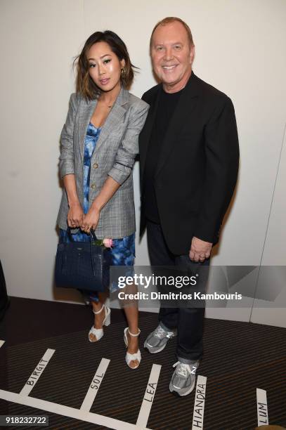 Aimee Song and Michael Kors attend the Michael Kors Collection Fall 2018 Runway Show at Vivian Beaumont Theatre at Lincoln Center on February 14,...