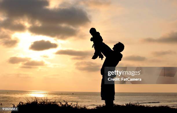 father and toddler silhouette - mystical baby girls stock pictures, royalty-free photos & images