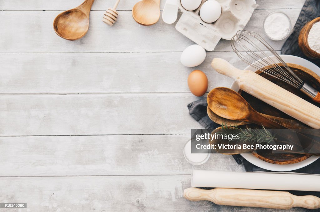 Arrangement of a variety of baking ingredients and utensils. Top view