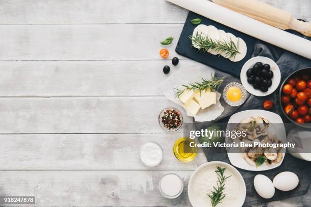 baking preparation background. freshly baked pizza. cooking process, italian food concept - flat lay stock-fotos und bilder