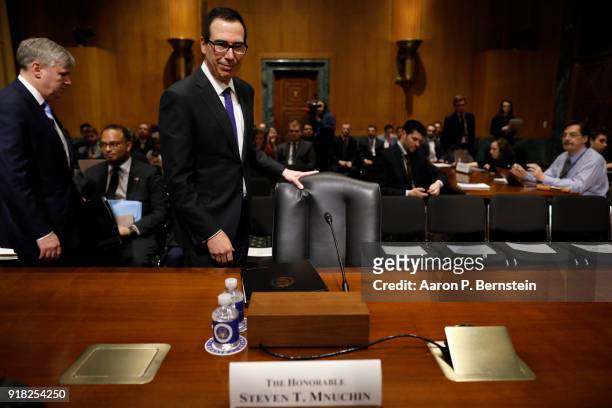 Treasury Secretary Steven Mnuchin arrives to testify before the Senate Finance Committee on Capitol Hill on February 14, 2018 in Washington, DC....