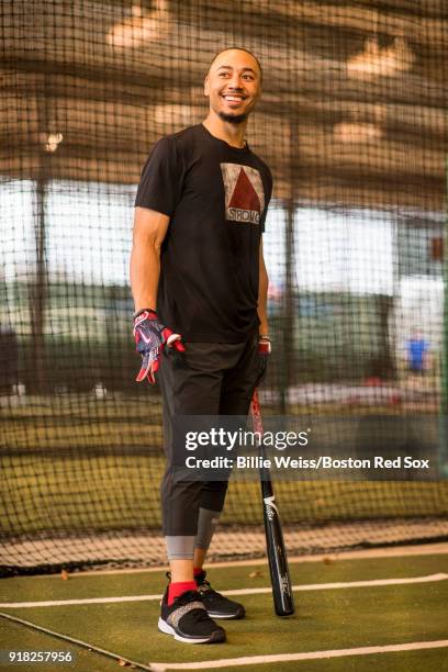 Mookie Betts of the Boston Red Sox reacts during a team workout on February 14, 2018 at Fenway South in Fort Myers, Florida .