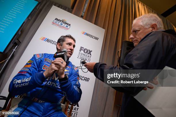 Xfinity Series driver Elliott Sadler speaks with the media during the Daytona 500 Media Day at Daytona International Speedway on February 14, 2018 in...