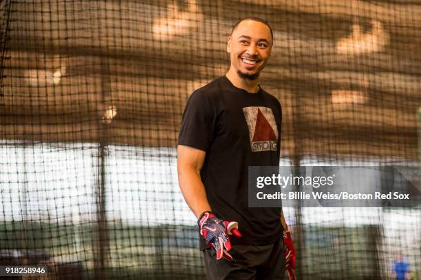 Mookie Betts of the Boston Red Sox reacts during a team workout on February 14, 2018 at Fenway South in Fort Myers, Florida .