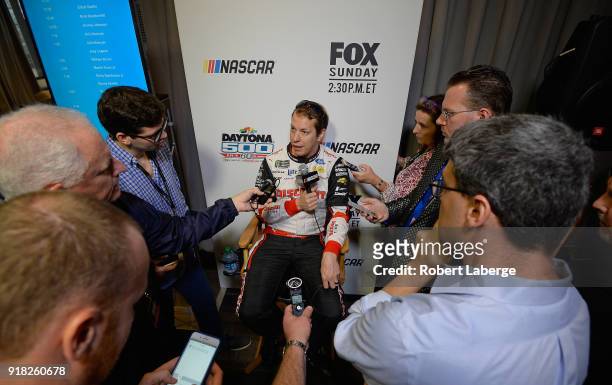Brad Keselowski, driver of the Discount Tire Ford, speaks with the media during the Daytona 500 Media Day at Daytona International Speedway on...