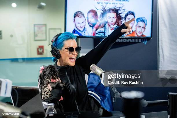 Jenny McCarthy with her dog D.J. Hosts the Jenny McCarthy show at SiriusXM Studios on February 14, 2018 in New York City.