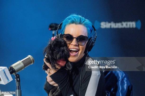 Jenny McCarthy with her dog D.J. Hosts the Jenny McCarthy show at SiriusXM Studios on February 14, 2018 in New York City.