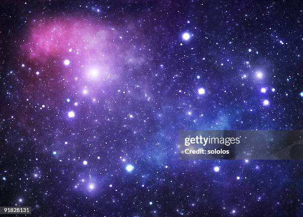 a background of space showing stars - blue galaxy stock pictures, royalty-free photos & images
