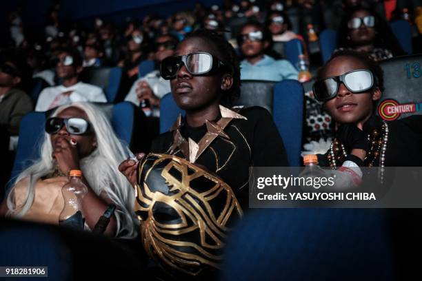 Csosplayers watch the film "Black Panther" in 3D which featuring Oscar-winning Mexico born Kenyan actress Lupita Nyong'o during Movie Jabber's Black...