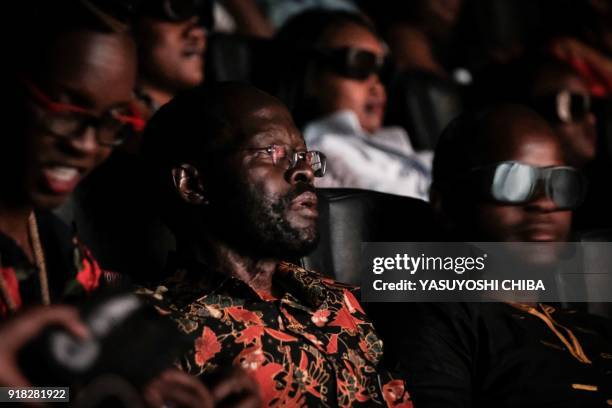 The Kisumu County Governor Peter Anyang Nyongo watches the film "Black Panther" which featuring his daughter Oscar-winning Mexico born Kenyan actress...