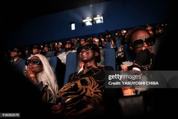 Csosplayers watch the film "Black Panther" in 3D which featuring Oscar-winning Mexico born Kenyan actress Lupita Nyong'o during Movie Jabber's Black...