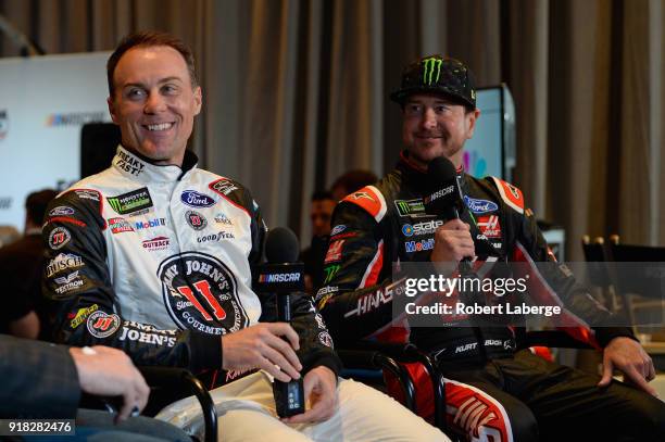 Kevin Harvick, driver of the Jimmy John's Ford, and Kurt Busch, driver of the Haas Automation/Monster Energy Ford, talk to the media during the...