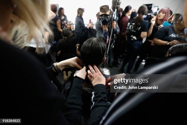 Models prepare backstage during the Leanne Marshall show during February 2018 New York Fashion Week: The Shows at Gallery II at Spring Studios on...