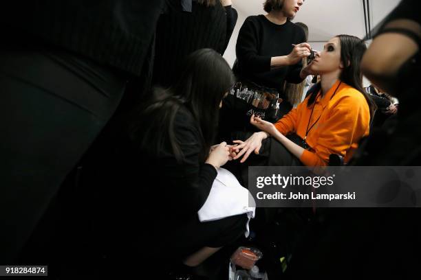 Models prepare backstage during the Leanne Marshall show during February 2018 New York Fashion Week: The Shows at Gallery II at Spring Studios on...