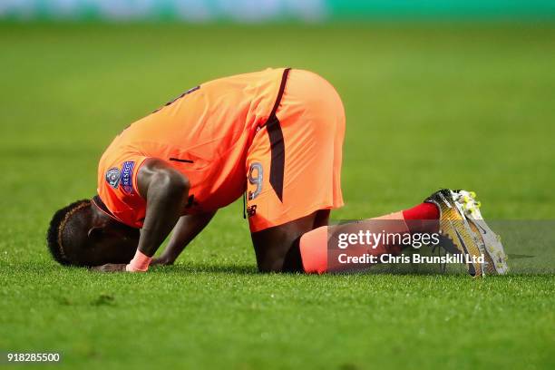 Sadio Mane of Liverpool celebrates after scoring the opening goal during the UEFA Champions League Round of 16 First Leg match between FC Porto and...