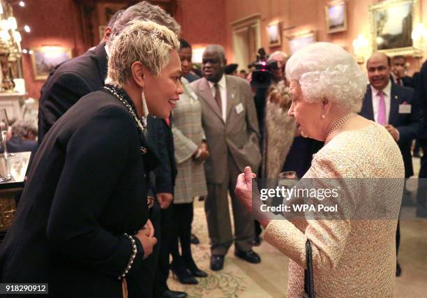 Queen Elizabeth II talks to Monica Galetti at a reception to celebrate the Commonwealth Diaspora community, in the lead up to the Commonwealth Heads...